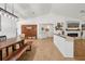 Open living space with a dining table, living room seating, and kitchen access at 2251 Evenglow Ave, Spring Hill, FL 34609