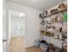 Spacious pantry features shelving and storage for food and cooking items at 2251 Evenglow Ave, Spring Hill, FL 34609
