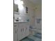 Cozy bathroom with a single sink vanity, commode and shower and tub combo at 2261 Swedish Dr # 37, Clearwater, FL 33763