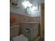 Bathroom features tile backsplash and neutral decor at 2261 Swedish Dr # 37, Clearwater, FL 33763
