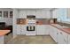 Well-lit kitchen with stainless appliances, practical layout, and efficient design at 2261 Swedish Dr # 37, Clearwater, FL 33763