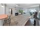 Open-concept living area showcasing the updated kitchen, modern decor, and comfortable seating at 2261 Swedish Dr # 37, Clearwater, FL 33763