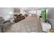 Spacious living area featuring comfortable seating and an entertainment center with a large television at 2261 Swedish Dr # 37, Clearwater, FL 33763