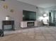 Inviting living room featuring modern decor, a large television, and stylish accent pieces at 2261 Swedish Dr # 37, Clearwater, FL 33763