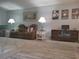 Spacious living room with comfortable seating, neutral colors, and a large area rug, perfect for relaxation at 2261 Swedish Dr # 37, Clearwater, FL 33763