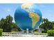 Remarkable globe sculpture set amidst lush landscaping, providing a unique community landmark at 2261 Swedish Dr # 37, Clearwater, FL 33763