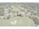 Aerial view of a property on a golf course; highlighted in red at 2275 Terrace View Ln, Spring Hill, FL 34606