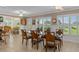 Bright dining area with plantation shutters, offering ample space for Gathering gatherings at 2275 Terrace View Ln, Spring Hill, FL 34606