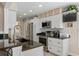 Beautiful kitchen with stainless steel appliances, granite countertops, and white cabinetry at 2275 Terrace View Ln, Spring Hill, FL 34606