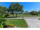 Street view of home with paver driveway and golf course view at 2275 Terrace View Ln, Spring Hill, FL 34606
