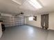 The two car garage features an automatic door and lots of space at 2414 San Luis Rd, Holiday, FL 34691