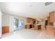 Large kitchen featuring stainless steel appliances and a sliding glass door to the backyard at 2414 San Luis Rd, Holiday, FL 34691