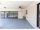 The spacious screened lanai offers a great view of the pool and backyard at 2414 San Luis Rd, Holiday, FL 34691