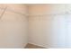 Walk-in closet with wire shelving providing ample storage space at 2414 San Luis Rd, Holiday, FL 34691