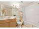 Bright, stylish bathroom featuring a modern vanity, and a tub with white tiled walls and coordinated decor at 2500 Winding Creek Blvd # G106, Clearwater, FL 33761