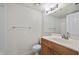 Bright bathroom featuring a vanity, toilet, and shower-tub combination at 2500 Winding Creek Blvd # G106, Clearwater, FL 33761