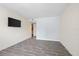 Bright bedroom featuring stylish tile flooring and TV at 2500 Winding Creek Blvd # G106, Clearwater, FL 33761