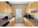 This kitchenette has ample countertop space and cabinetry, with an added convenience to serve and cater to residents at 2500 Winding Creek Blvd # G106, Clearwater, FL 33761