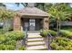 Community mailboxes surrounded by colorful landscaping, offering convenience and charm at 2500 Winding Creek Blvd # G106, Clearwater, FL 33761