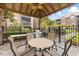 Community BBQ area featuring a grill, seating, and shaded gazebo for outdoor enjoyment at 2500 Winding Creek Blvd # I106, Clearwater, FL 33761