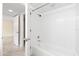 Clean bathroom featuring a tiled shower-tub combo at 2500 Winding Creek Blvd # I106, Clearwater, FL 33761