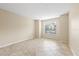 This is a cozy bedroom with neutral walls and tile flooring. Perfect for a peaceful retreat at 2500 Winding Creek Blvd # I106, Clearwater, FL 33761