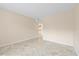 This bedroom is bright and airy with neutral walls and tile flooring at 2500 Winding Creek Blvd # I106, Clearwater, FL 33761