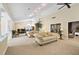 Bright clubhouse interior with comfortable seating, high ceilings, and stylish decor at 2500 Winding Creek Blvd # I106, Clearwater, FL 33761