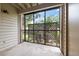 This screened patio provides a tranquil space with a view of lush greenery and privacy at 2500 Winding Creek Blvd # I106, Clearwater, FL 33761