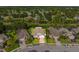 Charming single-story home featuring a well-maintained lawn, a driveway, and a classic design at 252 Arbor Woods Cir, Oldsmar, FL 34677