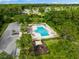 Enjoy the community pool with a playground nearby, perfect for Gathering fun and relaxation at 252 Arbor Woods Cir, Oldsmar, FL 34677