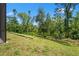 Spacious backyard offers lots of room to roam around the property at 25487 Dan Brown Hill Rd, Brooksville, FL 34602