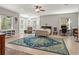 Large bedroom with bay window, a ceiling fan, and an elegant oriental rug at 25487 Dan Brown Hill Rd, Brooksville, FL 34602
