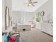 Bright bedroom with white furniture, large window and plenty of natural light at 25487 Dan Brown Hill Rd, Brooksville, FL 34602