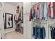 Walk-in closet offering custom shelving, drawers, and ample storage for clothing at 25487 Dan Brown Hill Rd, Brooksville, FL 34602