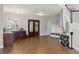 Welcoming entryway with hardwood floors, offering plenty of storage and coat racks as you enter this elegant home at 25487 Dan Brown Hill Rd, Brooksville, FL 34602