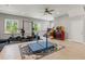 A well-lit home gym featuring weightlifting equipment, a punching bag, and a tool chest at 25487 Dan Brown Hill Rd, Brooksville, FL 34602