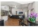 Open concept living room and kitchen area with hardwood floors and high ceilings at 25487 Dan Brown Hill Rd, Brooksville, FL 34602