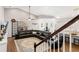Bright living room with a large leather sectional, open to the kitchen and dining area at 25487 Dan Brown Hill Rd, Brooksville, FL 34602