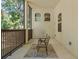 The patio has neutral outdoor carpeting and furniture offering views of the lush backyard at 25487 Dan Brown Hill Rd, Brooksville, FL 34602