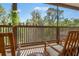 Charming screened porch with a view of lush greenery, perfect for outdoor enjoyment at 25487 Dan Brown Hill Rd, Brooksville, FL 34602