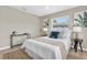 Stylish bedroom with natural light, comfortable bedding, and contemporary decor, creating a cozy retreat at 2954 Leisure Ct, Dunedin, FL 34698