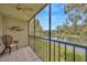 Relaxing screened lanai with water view; perfect place to enjoy the Florida weather at 3134 Lake Pine Way # F2, Tarpon Springs, FL 34688