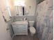 Bathroom features a sink, commode, and an ocean themed shower curtain at 3336 Gulfview Dr, Hernando Beach, FL 34607
