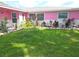 Attractive front yard with lush green grass and mature landscaping, creating a picturesque setting at 3336 Gulfview Dr, Hernando Beach, FL 34607