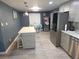Modern kitchen with stainless steel appliances, ample counter space, and stylish cabinetry at 3336 Gulfview Dr, Hernando Beach, FL 34607