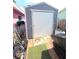 Exterior view of the shed, offering ample storage space for tools and equipment, located on the side of the home at 3336 Gulfview Dr, Hernando Beach, FL 34607