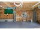 Spacious basement with plywood walls, concrete flooring, and ample natural light through the window at 3363 Poinsettia Dr, Hernando Beach, FL 34607