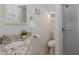 Clean bathroom with updated vanity, sink, and shower at 3363 Poinsettia Dr, Hernando Beach, FL 34607