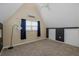 Bedroom featuring a neutral color palette, vaulted ceilings and an accent wall at 3363 Poinsettia Dr, Hernando Beach, FL 34607